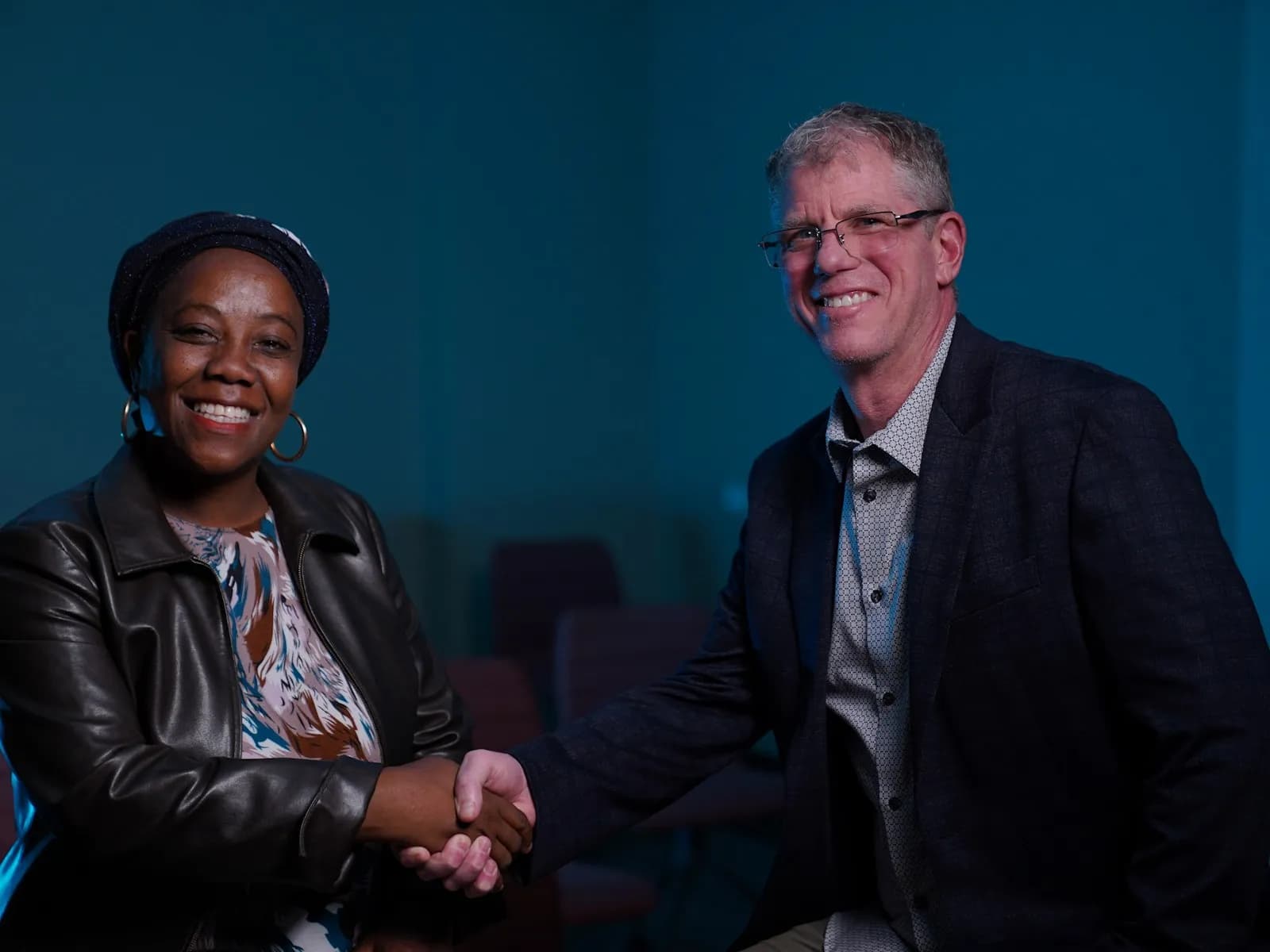 Two ministry leaders shaking hands
